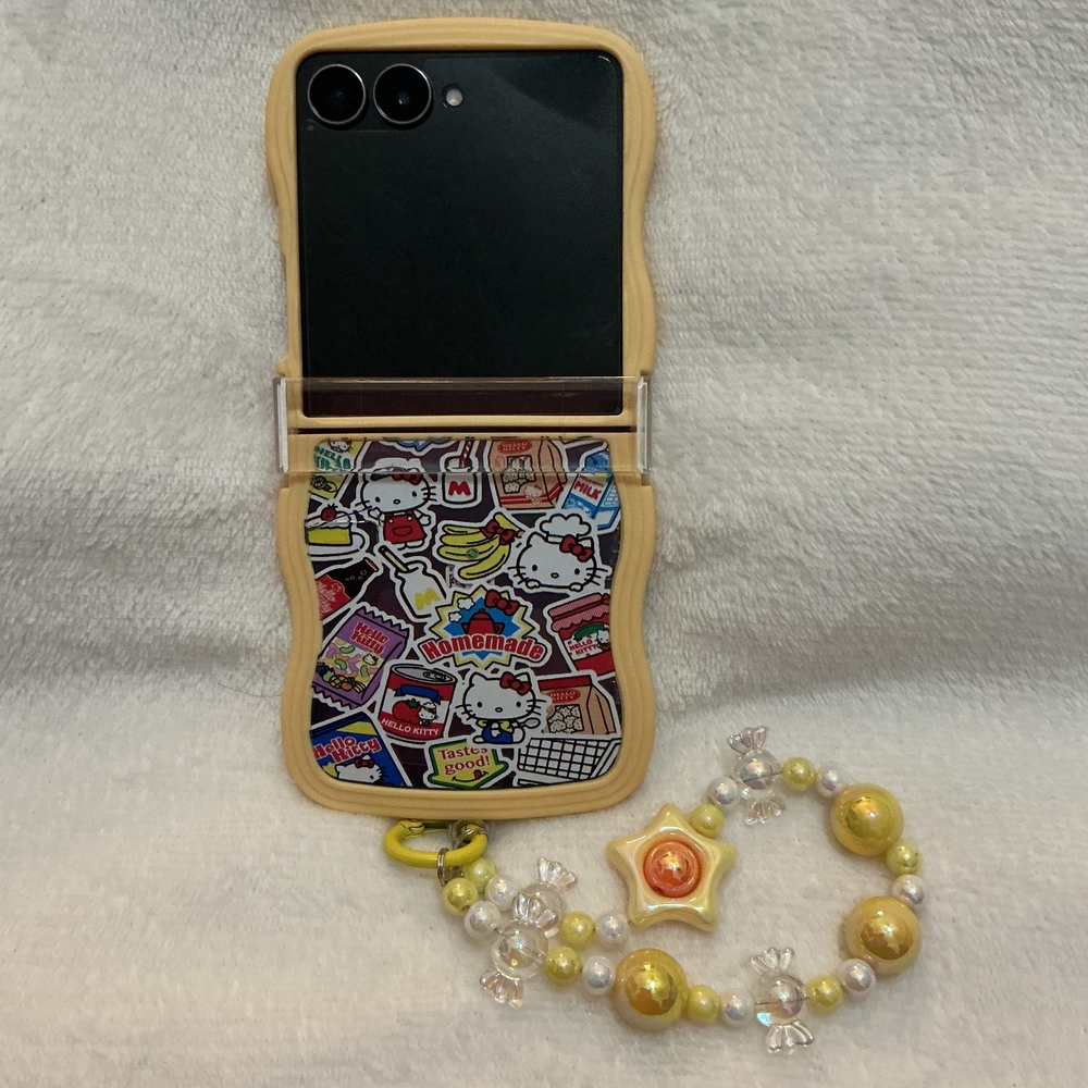 Galaxy Z Flip 7 Hello Kitty Yellow Sticker Phone Case with Beaded Charm